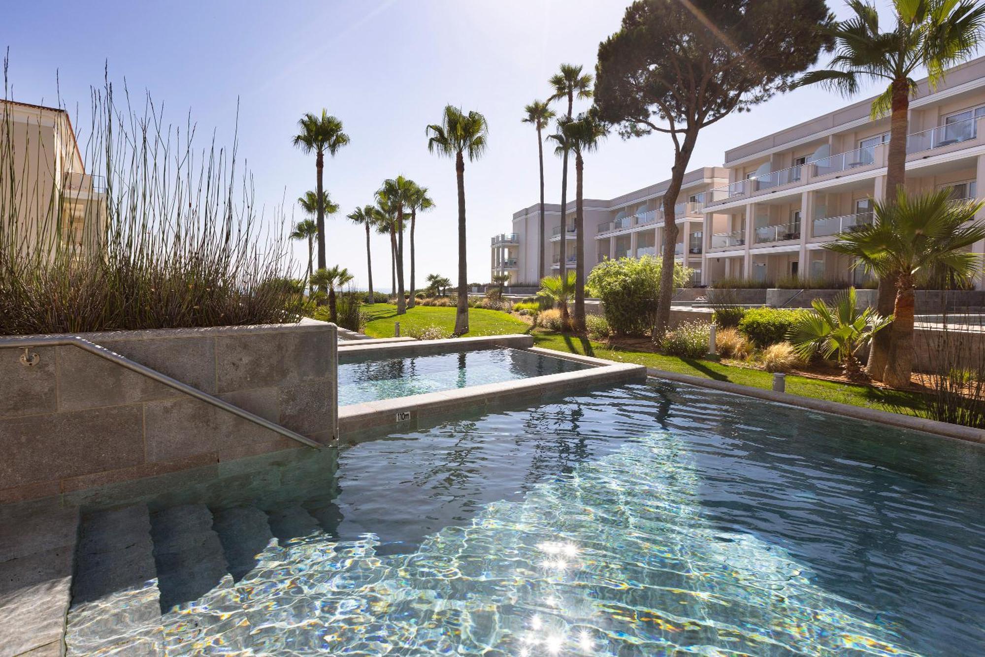 Hipotels Barrosa Palace & Spa Chiclana de la Frontera Exterior photo The hotel's swimming pool